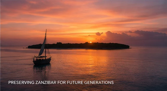 Traditional dhow sailing at sunset near a Zanzibar island